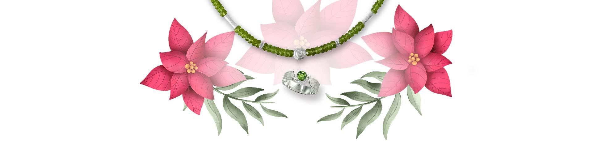 Peridot-Schmuck und Peridot-Ring vor Weihnachtsstern